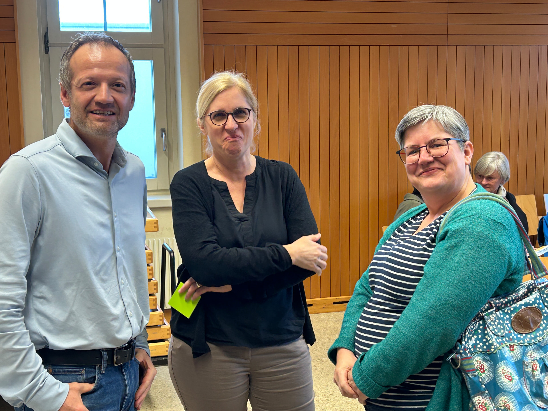 Drei Teilnehmende beim Netzwerktreffen